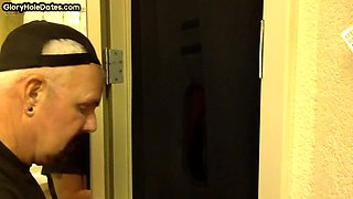 Gloryhole amateur DILF sucks and wanks BFs penis at home