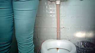 Chunky mature white woman in the public toilet room for ladies