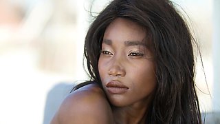 Confident ebony teen shows her dark cunt