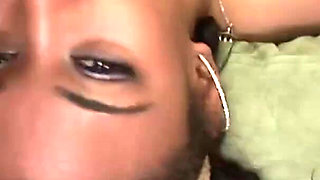 Ebony Slut Is Blowing a Lot of Hard Black Cocks on Her Knees