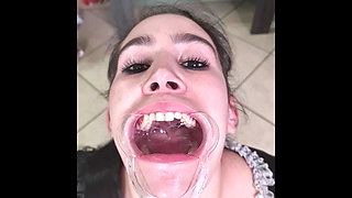 French maid tries to swallow her own piss through lip retractor
