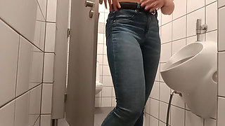 masturbating with a dildo in restroom full of people