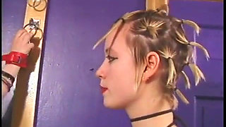 Two mistresses tweak bdsm fattie's boobs and whip her ass