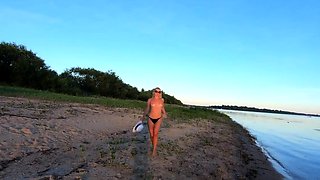 Russian Nudist on the River Shore