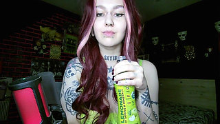 Sexy Alternative Redhead Drinking Soda and Burping