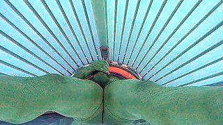 Masturbating in public tanning bed