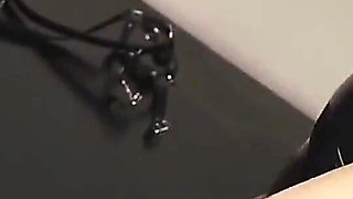 Latex Officer Fucks His Latex Prisoner with a Strap-on