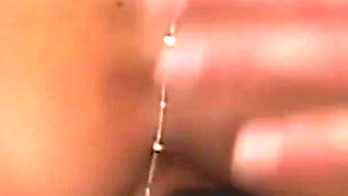 She Shows Her Boobs and Gives a Blowjob in the Back Seat of the Car.