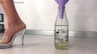 Hairy Mature Wife Peeing in a Bottle Through a Funnel