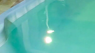 Caught in the Act! Two Brunettes Caught Masturbating in the Condo's Pool