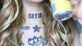 Sexy Alternative Blonde Drinking and Burping