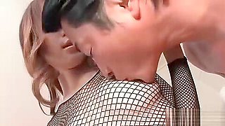 Sara Seori in a fishnet body suit with a horny older man
