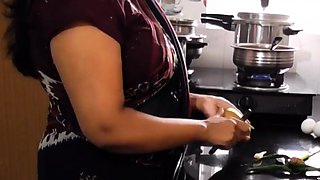 Indian milf with big natural tits gets banged in the kitchen