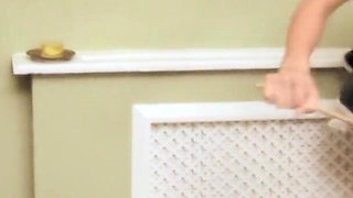 Blonde is on her knees licking busty brunette's cunt