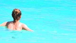 Smoothest nudist play in the warm water  at a nudist beach