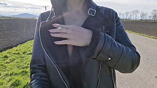 I take off my bra and blouse and show my tits while walking