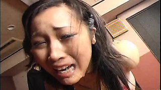 Alluring Japanese babe fingered and worked in bondage