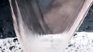 My pointing in the hot tub with the waterfall