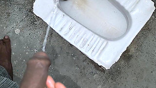 Desi Bhabhi Holding Stepbrother-in-law's Penis and Making Him Pee and Peeing Herself