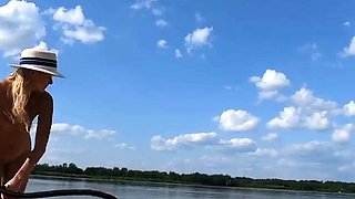 Big-Ass Blonde's Naked Walk on a Paddleboard