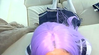 A purple-haired youthful adult girl in a sailor