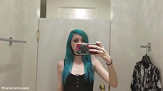 Stunner with blue hair is draining in the switching bedroom and attempting not to squeal while jizzing