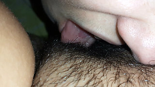 I press her head closer to my hairy pussy with my hand so I can cum harder