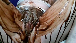 Pussy soaking and cumming with chocolate over clit