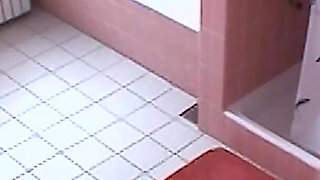 Amateur blonde masturbates on toilet
