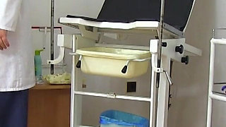 Gyno examination of blonde mature woman