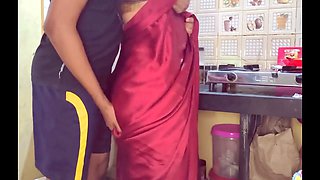 Indian aunt Kavitha catches hot moment with her beau while talking to her hubby in the kitchen, then intense hardcore action