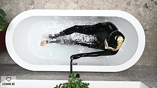 Latexdoll in the Bathtub