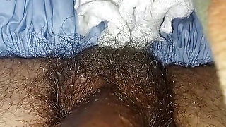 Very good looking guy rubbing his dick on his bed