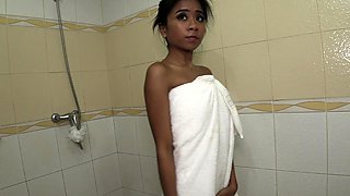 Beautiful Thai stripper with perky tits showering