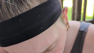 Blonde beauty giving a wet blowjob on the patio