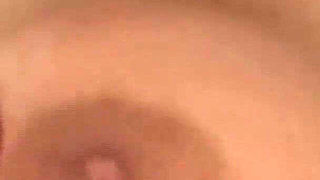 Brunette with Big Tits Gets Fingered on Bed with Rose Sheets