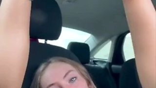 Slut with her feet in the car