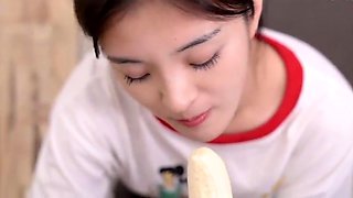 chinese girl sucks banana and then...