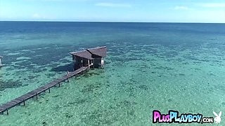 Gorgeous blond hair lady mommy posing on the sea