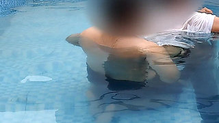 A Hot Couple's Risky Fun in the Swimming Pool.