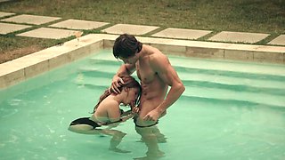 A couple enjoys passionate sex by the pool with Blake Eden