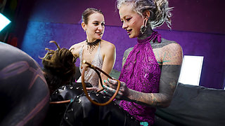 Heavy TATTOOED sub played with and PEGGED by 2 dominas