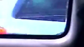 Horny Brunette MILF Fingers Dripping Pussy in Backseat Adventure