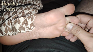 Stepsister's feet get a light massage while watching a movie