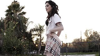 Pale brunette babe Evelyn Claire undressed and fucked on the bed