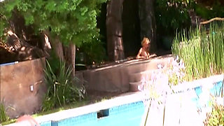 He Is Lying by the Pool When She Sits on His Cock