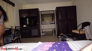 Guy feeding a hot Thai teens hairy pussy