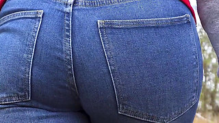 MILF In Blue Jeans Bends Over And Flashing Her Big Ass Outdoors