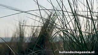 Candice Hell red swimsuit BJ on sandy dunes under blue sky