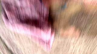 Tattooed busty brunette with foot fetish does hot footjob